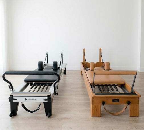 Balanced Body vs Gratz: Which Pilates Reformer Is Right for You?