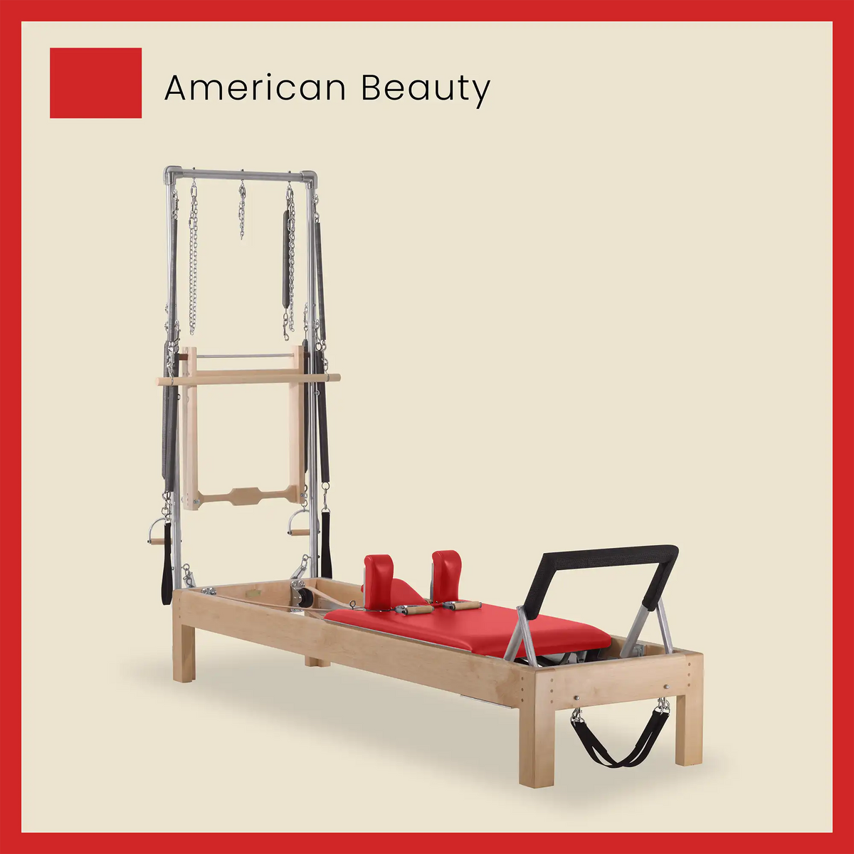 Pilates reformer machine with attachments on a beige background, branded 'American Beauty'.