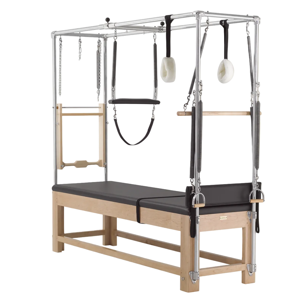 Gratz Designer Cadillac Tower in KunaBelly upholstery, luxury Pilates equipment for professional studio.