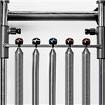 Contemporary Pilates reformer in a bright studio space.