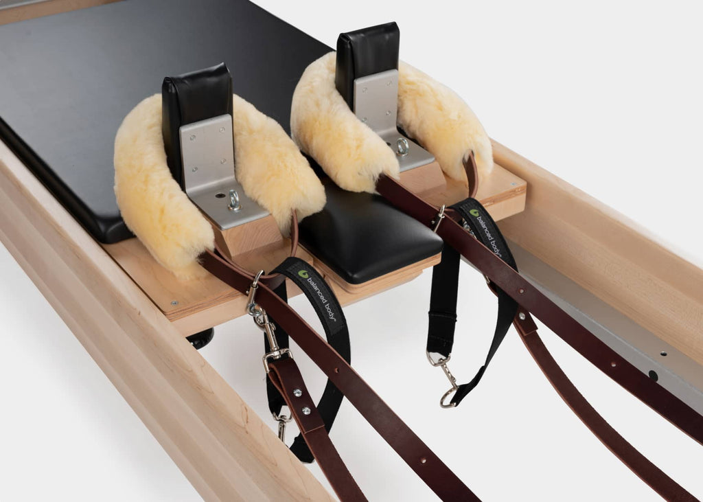 Close-up of the leather straps and ropes on the Fletcher Edition Reformer.