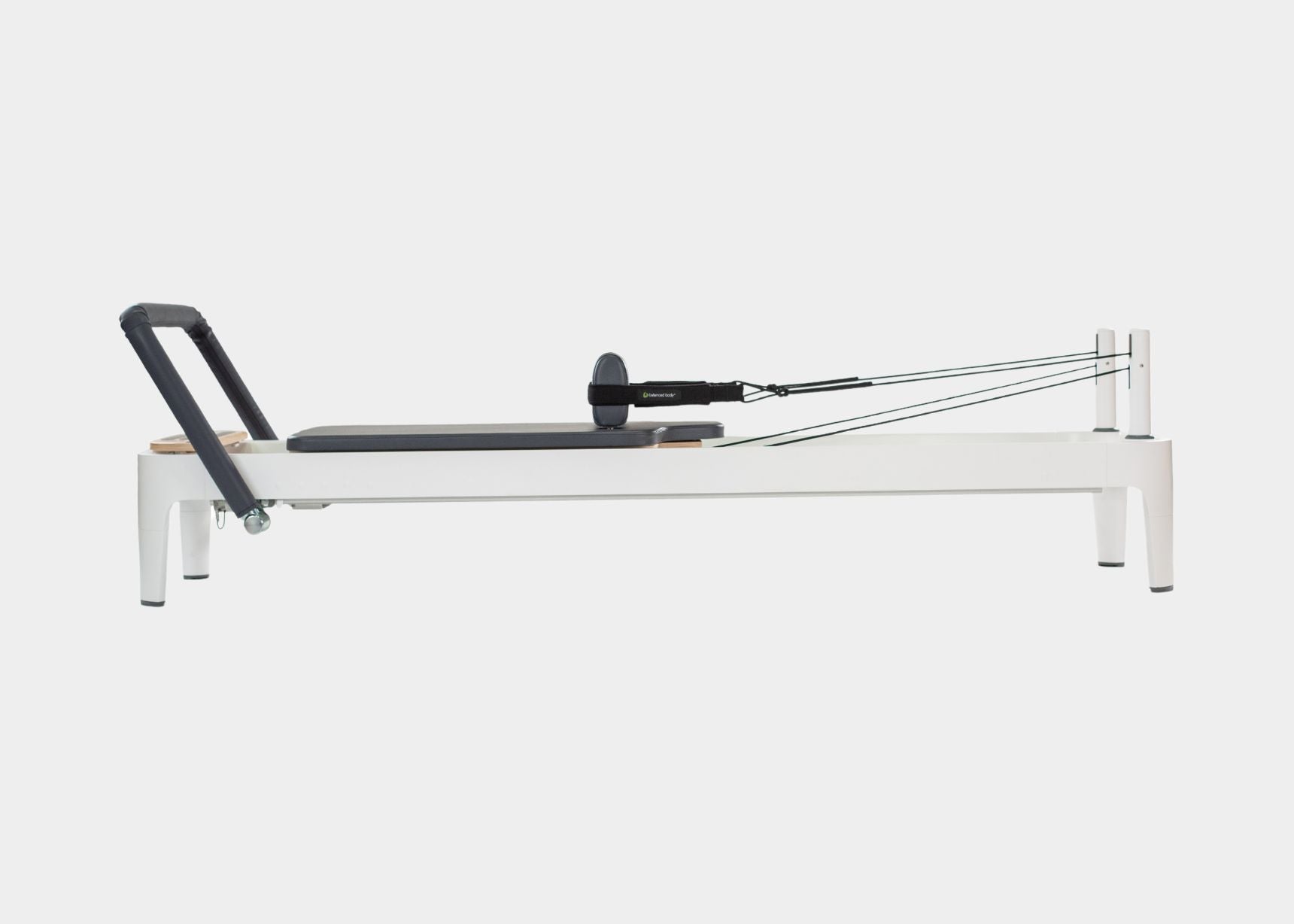 Side view of a Balanced Body aluminum Allegro reformer.
