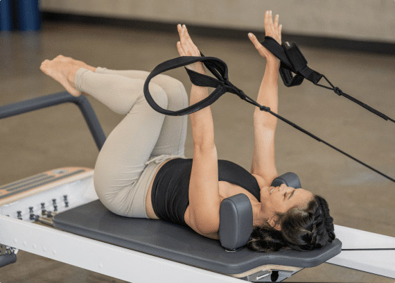 Graphic illustrating the health benefits of using a Pilates reformer.