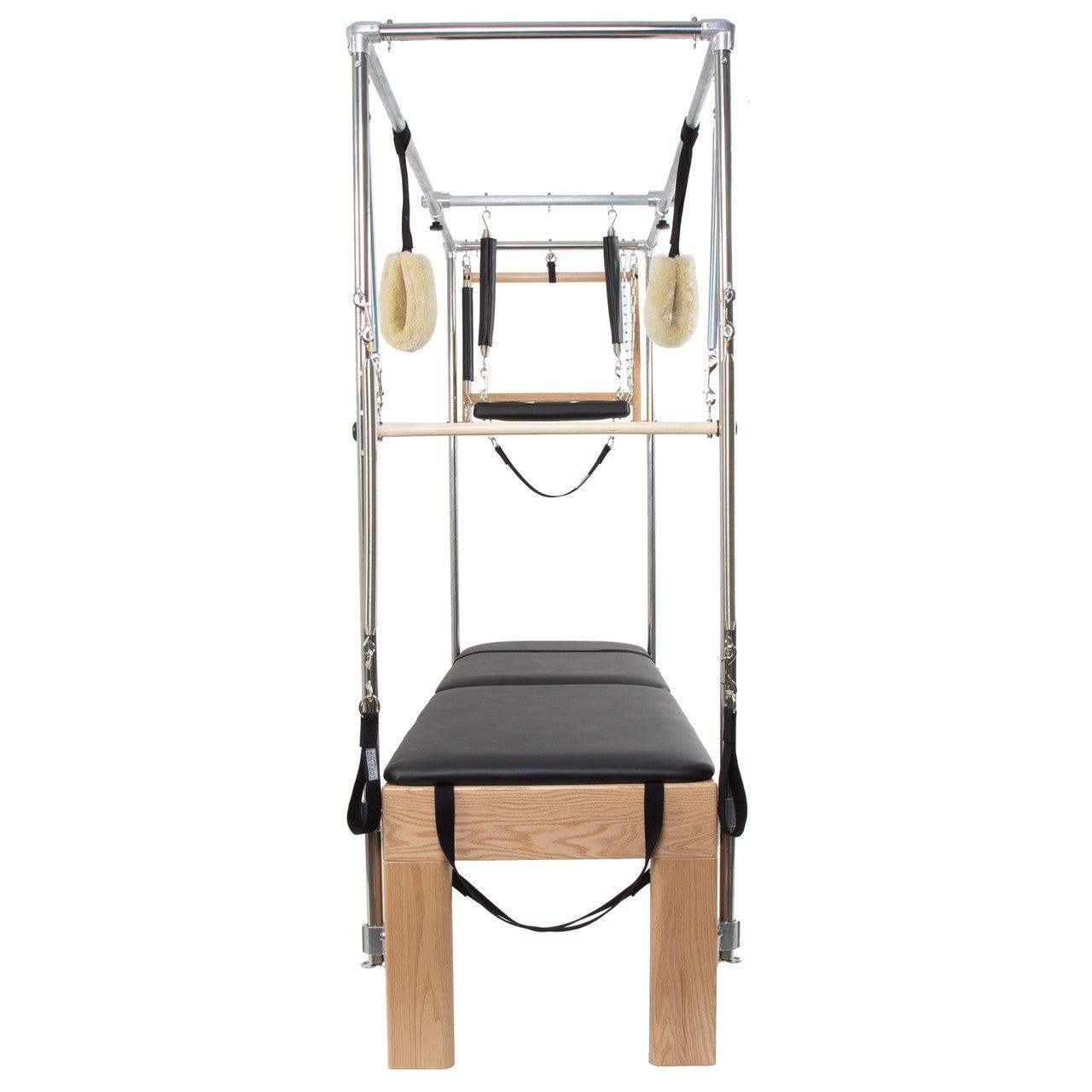 Front view of a Gratz wooden Cadillac Tower and Reformer combination.