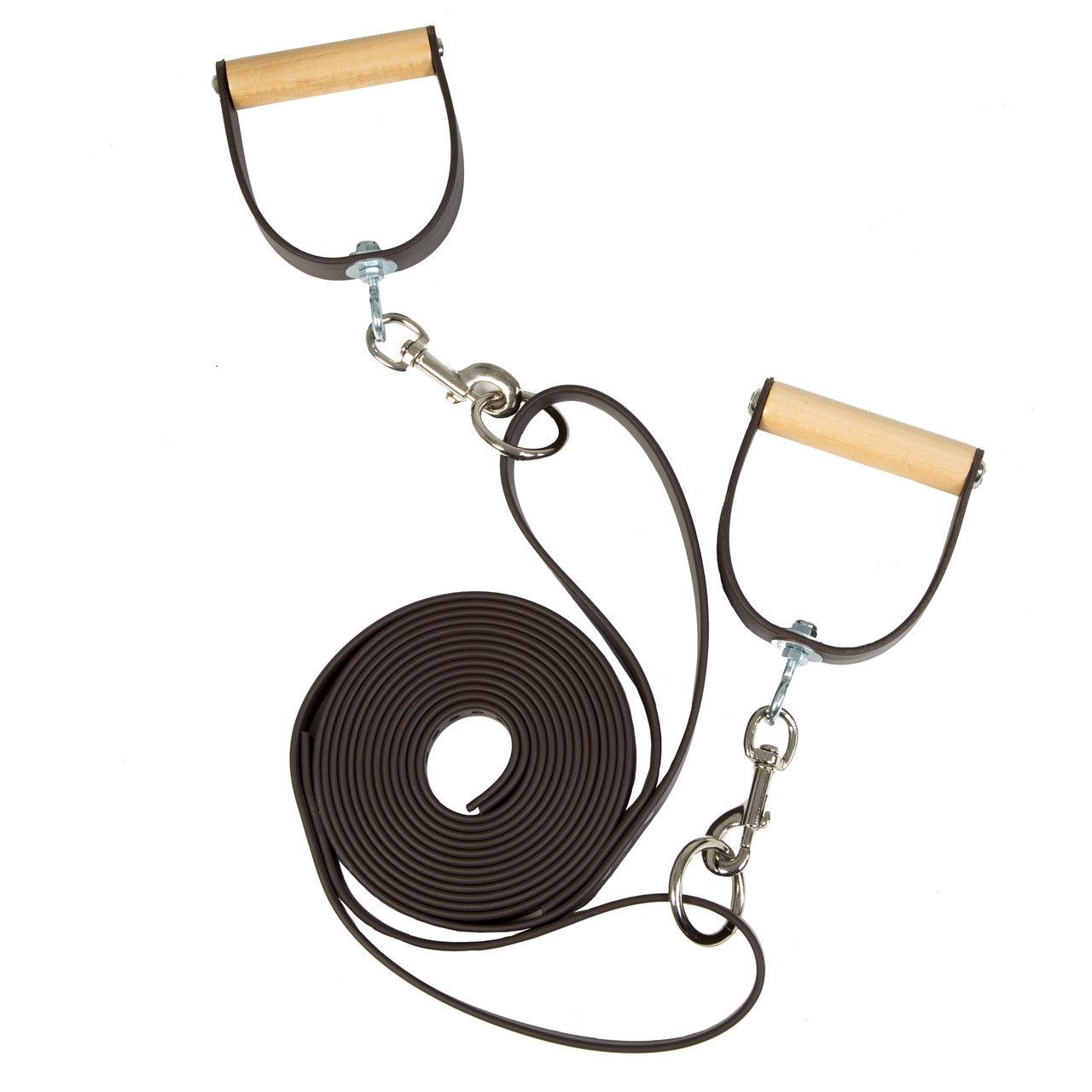 Wooden handles and ropes detail on a Gratz Cadillac Pilates reformer.