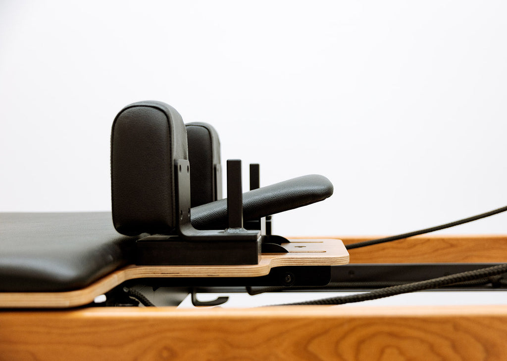 Adjustable headrest feature on the Flexia Smart Pilates Reformer.